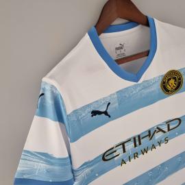 Camiseta 22/23 Manchester City Conmemorativa Blanca Azul