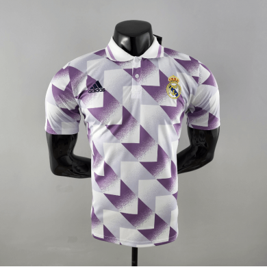 POLO 22/23 REAL MADRID MORADO Y BLANCO